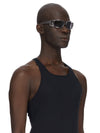 Rick Owens runway look featuring avant garde layered outfit with sculptural silhouette and dark tonal styling