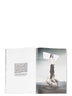 Rick Owens runway look featuring avant garde layered outfit with sculptural silhouette and dark tonal styling