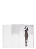 Rick Owens runway look featuring avant garde layered outfit with sculptural silhouette and dark tonal styling