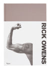 Rick Owens runway look featuring avant garde layered outfit with sculptural silhouette and dark tonal styling