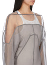 Rick Owens runway look featuring avant garde layered outfit with sculptural silhouette and dark tonal styling