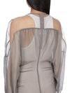 Rick Owens runway look featuring avant garde layered outfit with sculptural silhouette and dark tonal styling